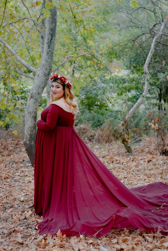 Bridesmaid in a dress with maroon long sleeves