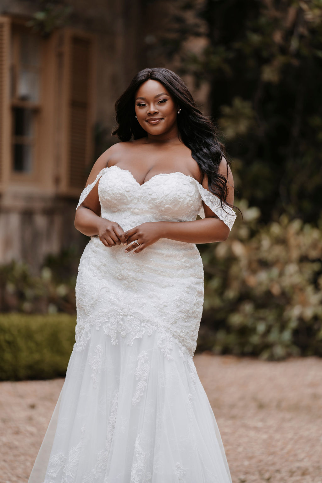 bride smiling at an outdoor photoshoot