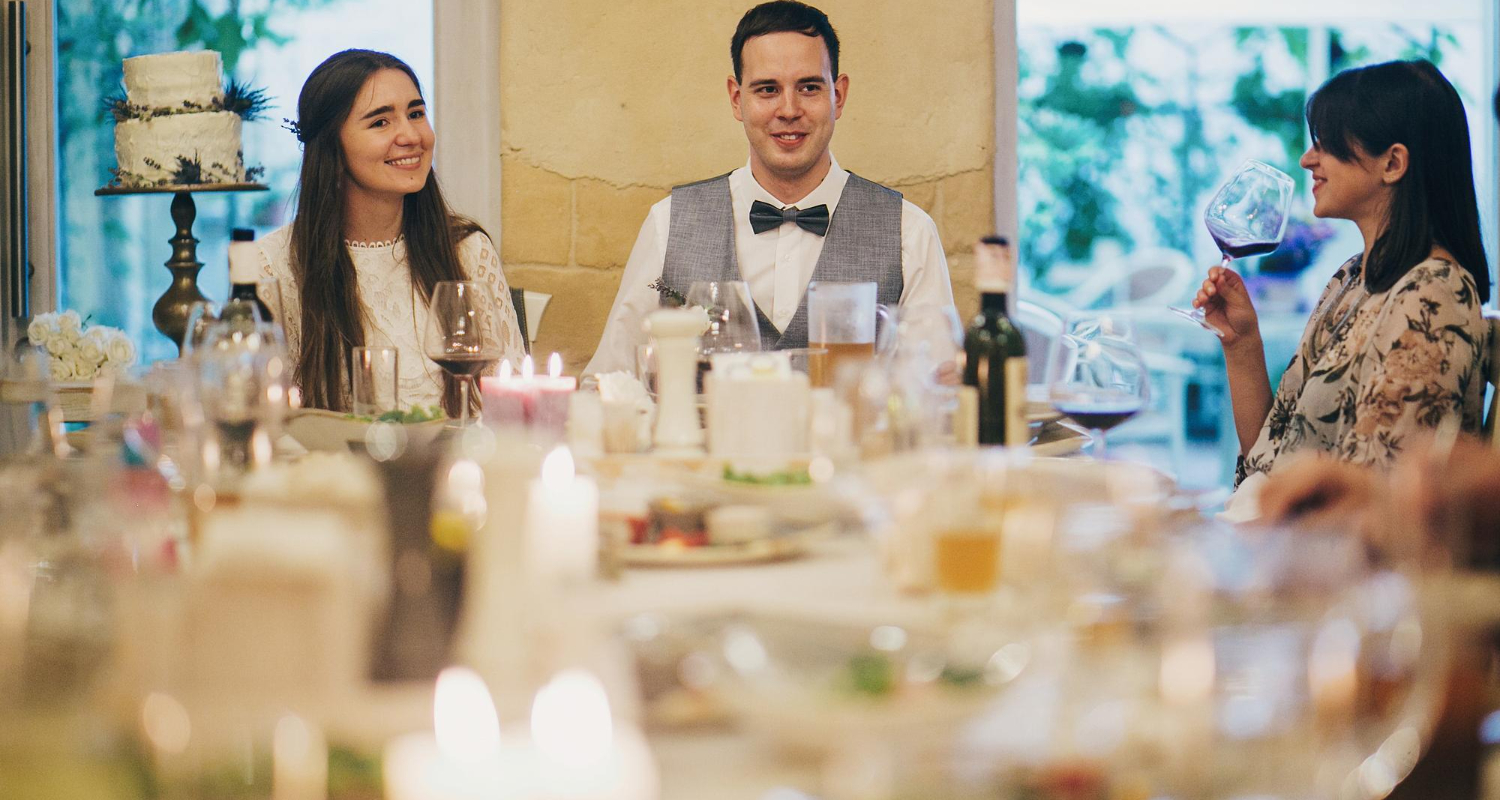 Wedding guests dining and celebrating.