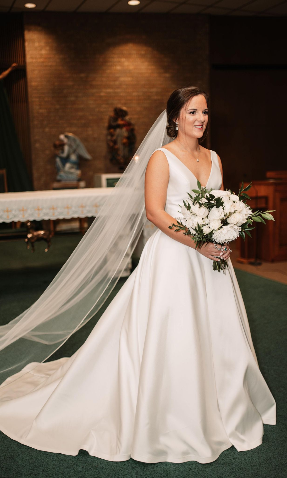 Bride looking gorgeous - posing for a picture at a function